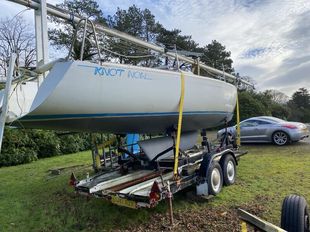 Bargain Buy._ Unwanted racing yacht!