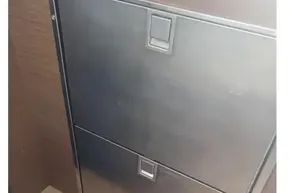 Stainless steel storage compartment on 2020 Lagoon 46 yacht interior.