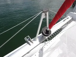 Leopard 40 catamaran deck detail with red sail, 2021 model.