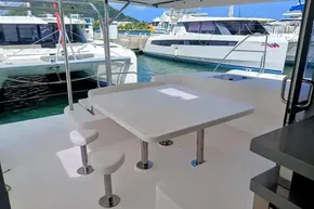 Outdoor seating area on a 2017 Leopard 48 yacht, docked at a marina.