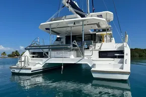 2022 Leopard 42 catamaran on calm water, featuring modern design and spacious deck.
