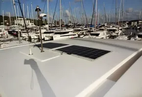 2017 Leopard 43 Powercat with solar panels docked in a marina.