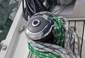 Winch and ropes on 2020 Beneteau Oceanis 46.1 sailboat deck.