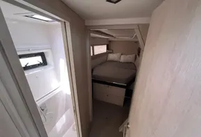 2019 Leopard 45 yacht interior with bedroom and bathroom.