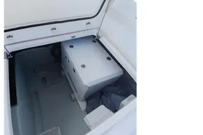 Engine compartment of 2022 Leopard 45 yacht, showcasing storage and mechanical components.