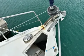 Bow of 2023 Beneteau Oceanis 51.1 yacht with anchor and winch system.