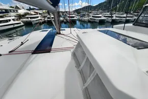 2020 Leopard 50 catamaran docked in a marina with surrounding boats.