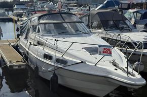 1991 Sealine 290 Ambassador boat docked, for sale sign visible.