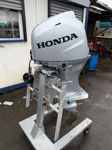NEW HONDA BF50LRTU OUTBOARD ENGINE. SOME DAMAGE