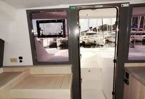 Interior view of 2017 Leopard 43 Powercat with marina in the background.