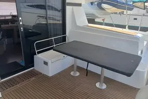 2024 Lagoon 42 yacht deck with table and seating area.