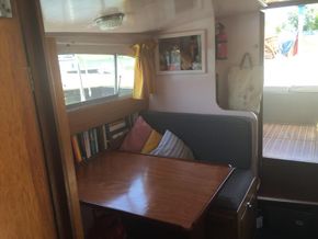 Interior of cabin, looking out from v-berth/bedroom