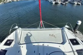 2022 Leopard 45 catamaran docked, featuring a trampoline deck and marina view.