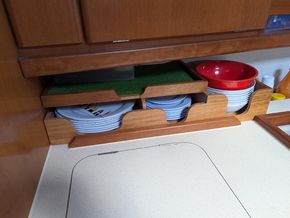 Storage tray for plates, etc.