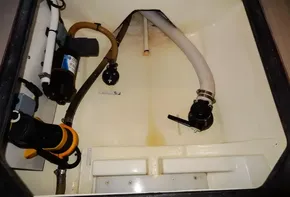 Engine compartment of a 2017 Leopard 43 Powercat with various hoses and components.