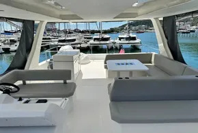Luxurious 2022 Leopard 53 Powercat yacht interior with marina view.