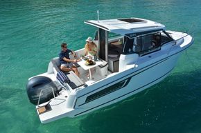 Jeanneau Merry Fisher 695 wheelhouse boat - sitting at the cockpit table