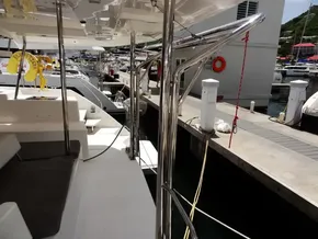 Leopard 40 catamaran docked at marina, showcasing sleek design and spacious deck, 2021 model.