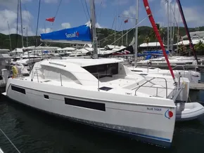 2021 Leopard 40 catamaran docked at marina, featuring sleek design and spacious deck.