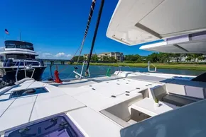 Luxury Leopard 50 yacht deck with scenic waterfront view, 2022 model.