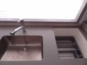 Modern kitchen sink and faucet in a 2020 Leopard 43 Powercat yacht.