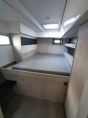 2017 Leopard 51 Powercat bedroom with modern design and natural light.