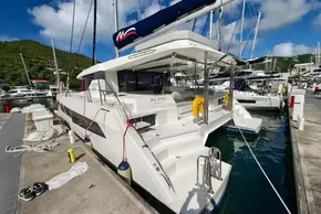 Luxury Leopard 50 catamaran docked at marina, 2021 model, sunny day.