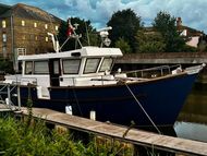 SHARES Motor boat nestled in Sandwich