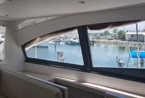 Interior view from a 2017 Leopard 48 yacht overlooking a marina.
