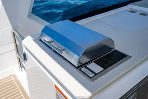 Outdoor grill on 2025 Leopard 40 Powercat yacht deck, overlooking ocean.