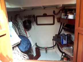 Forward storage with access to anchor locker