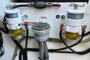 Engine compartment of 2024 Leopard 40 Powercat with fuel filters and water separators.