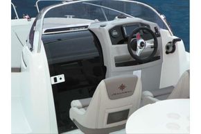 Jeanneau Cap Camarat 5.5 WA - helm and co-pilot seats + engine controls + door to cuddy