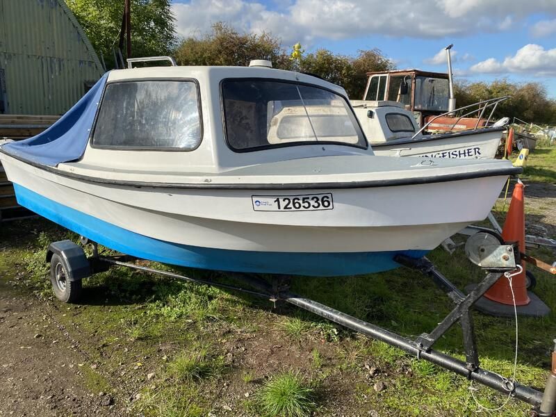 14’ Dejon with Honda 9.9hp & trailer