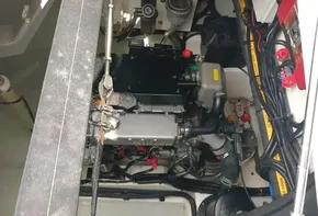 Engine compartment of a 2019 Leopard 45 catamaran, showcasing mechanical components and wiring.
