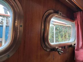 Cabin opening portlights