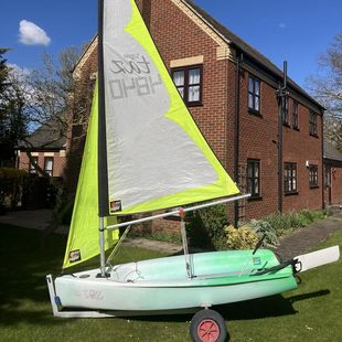 Topper Taz sailing dinghy with alloy launching trolley