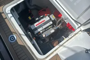 Engine compartment of 2024 Lagoon 42 catamaran with Yanmar engine visible.