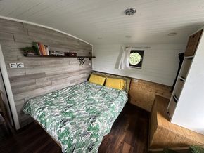 Roomy king bed with plenty of storage and light.