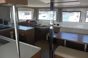 Interior of 2020 Lagoon 46 catamaran with modern kitchen and dining area.