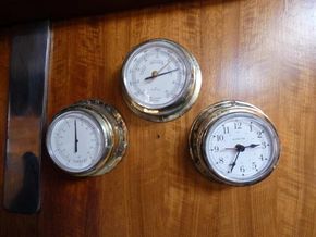 Barometer, clock and thermometer
