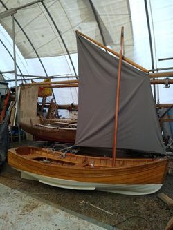 Wooden sailing dinghy