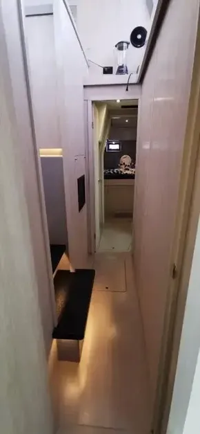 Narrow hallway inside a 2019 Leopard 51 Powercat yacht with modern interior design.
