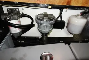 Engine compartment of a 2017 Leopard 43 Powercat showing fuel filter and components.
