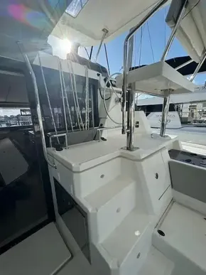 Leopard 50 yacht, 2020 model, featuring sleek white stairs and modern design elements.