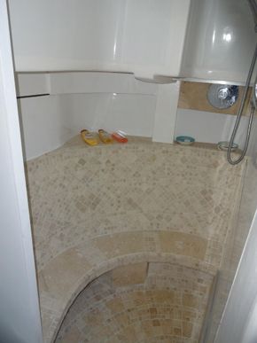 Mosaic Tiled Shower Area In Forward Bathroom