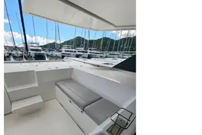 2020 Leopard 50 yacht cockpit with seating, docked at marina.