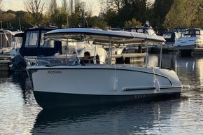 2015 Alfastreet 23 boat named Xanadu docked in a marina.