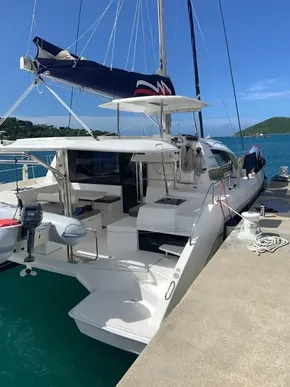 2020 Leopard 40 catamaran docked at a marina with clear blue water.