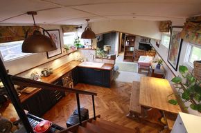 steps down into kitchen area